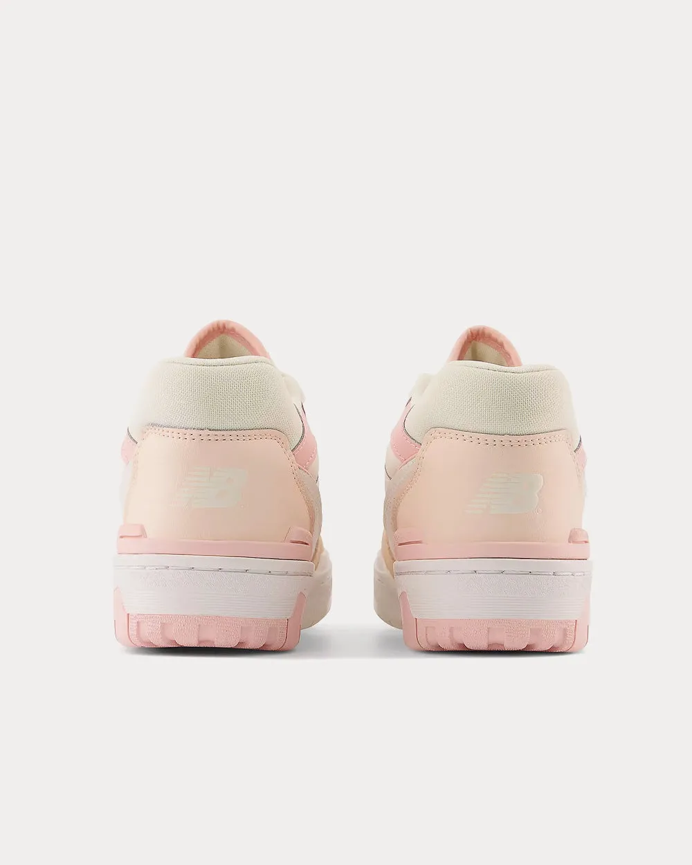 550 White / Pink Low Top Sneakers